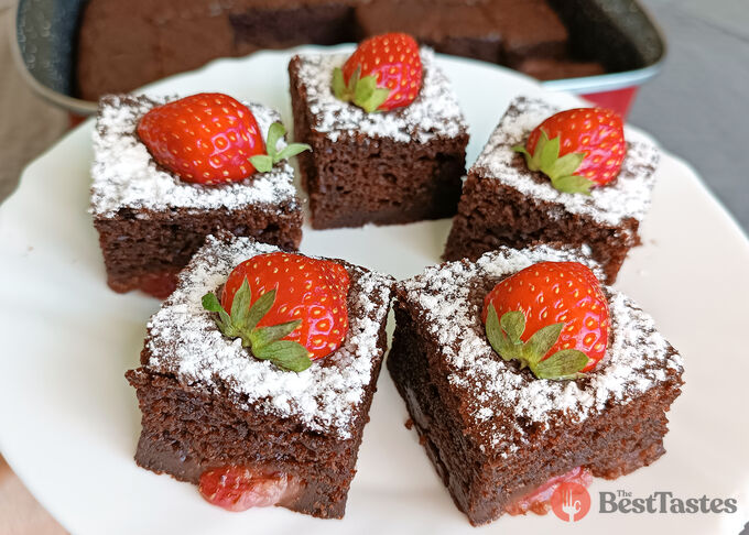 Recipe Soft eggless yogurt cake with cocoa and strawberries.